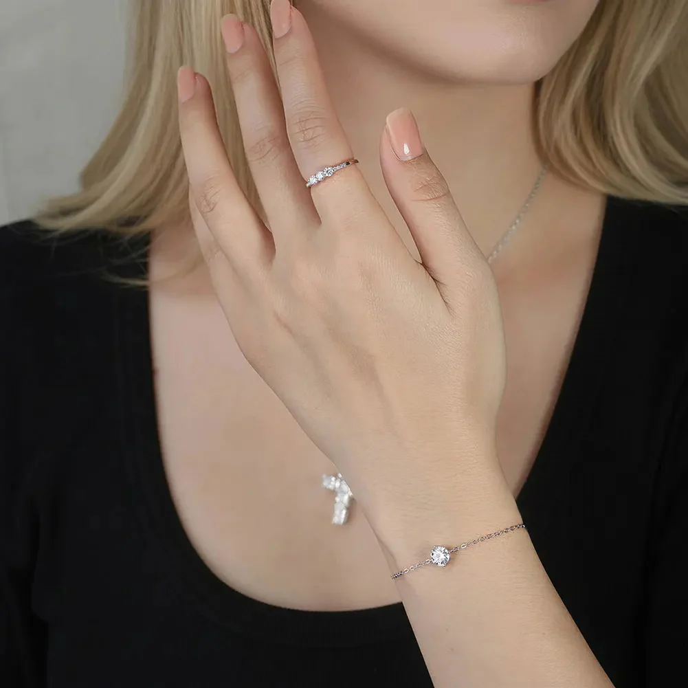 CLASSIC ROUND MOISSANITE THREE-STONE BAND RING IN STERLING SILVER - Image 3