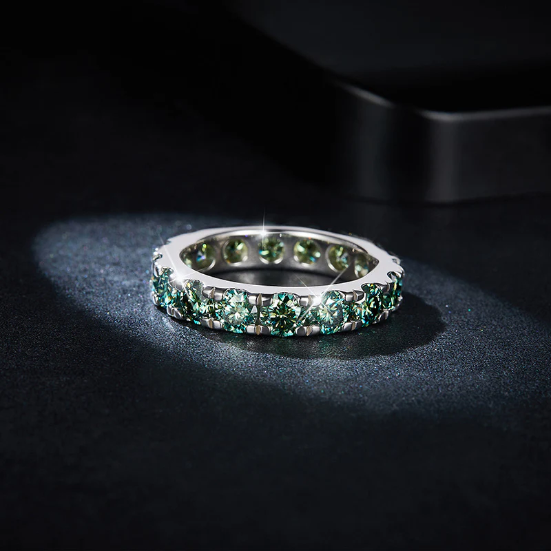 GREEN ROUND MOISSANITE ETERNITY BAND RING IN STERLING SILVER - Image 5