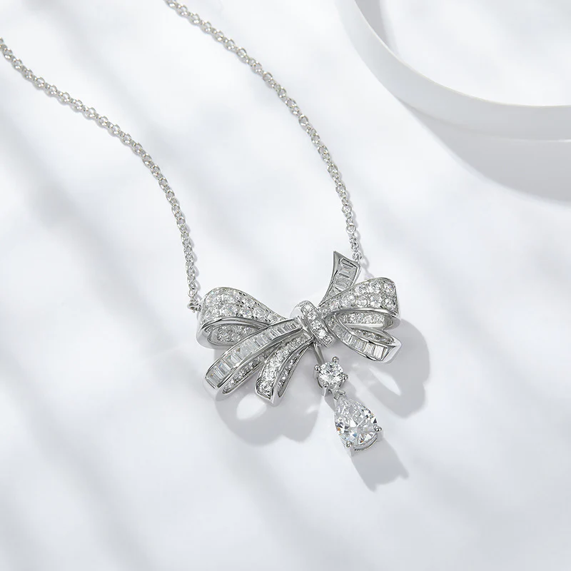 IE0008 BOW KNOT MOISSANITE PENDANT NECKLACE IN STERLING SILVER - Image 2