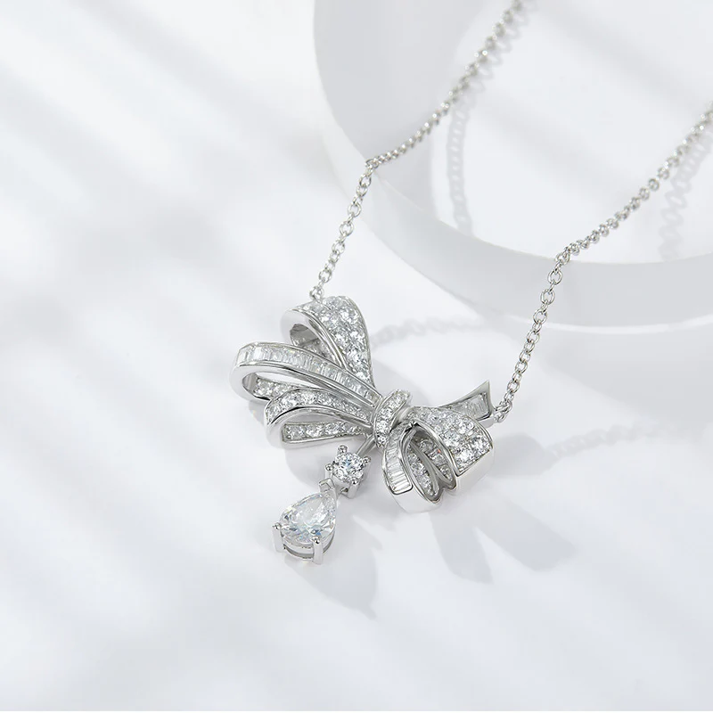 IE0008 BOW KNOT MOISSANITE PENDANT NECKLACE IN STERLING SILVER - Image 3