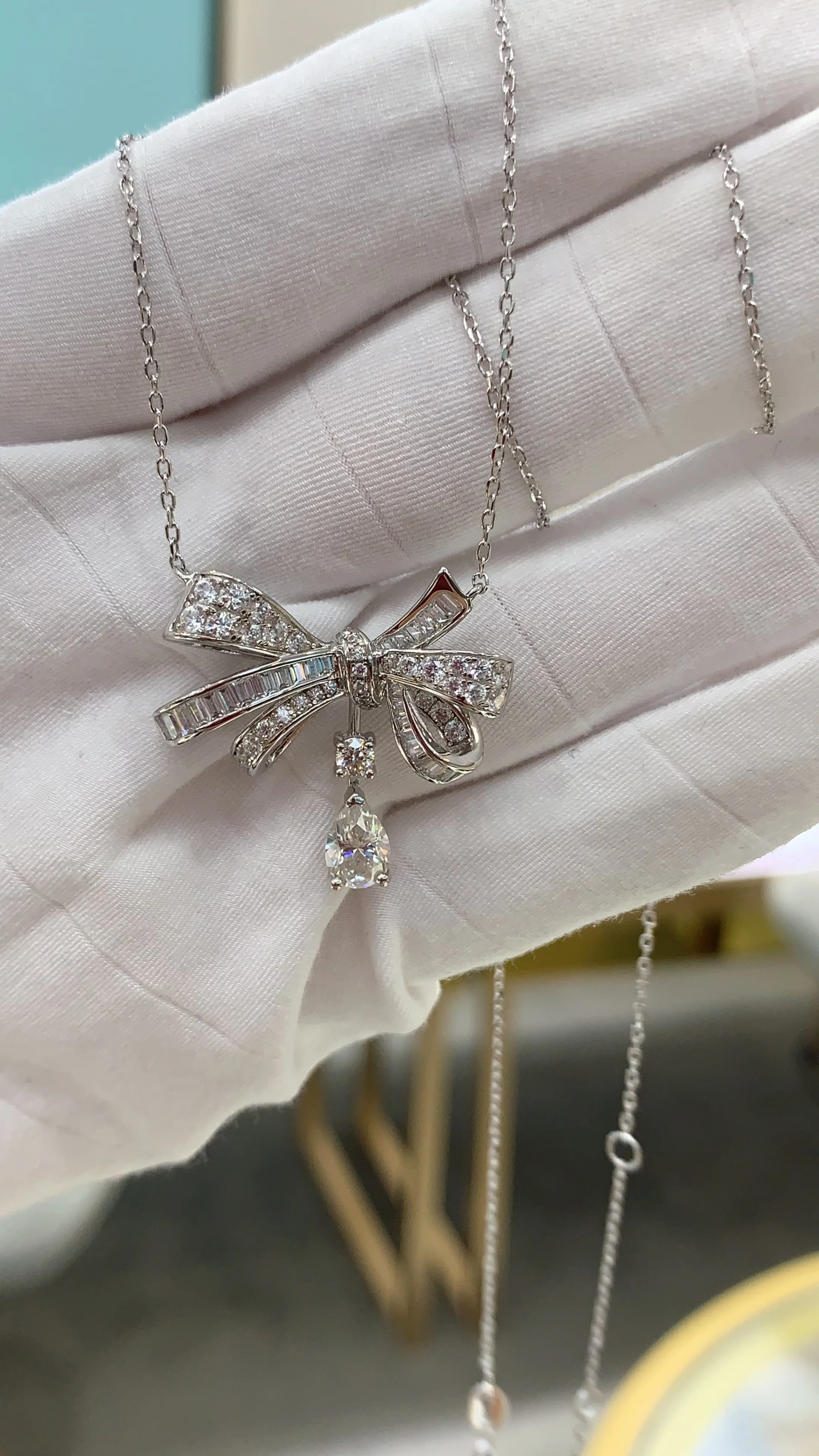 IE0008 BOW KNOT MOISSANITE PENDANT NECKLACE IN STERLING SILVER - Image 5