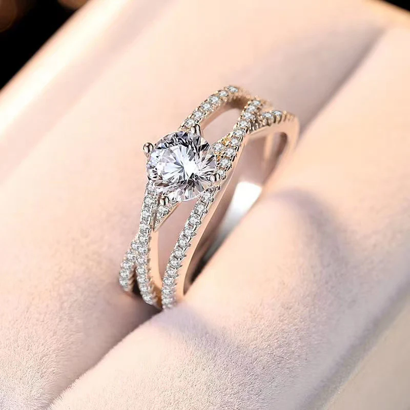 IE1013 ROUND CUT INTERWOVEN MOISSANITE ENGAGEMENT RING IN STERLING SILVER - Image 5