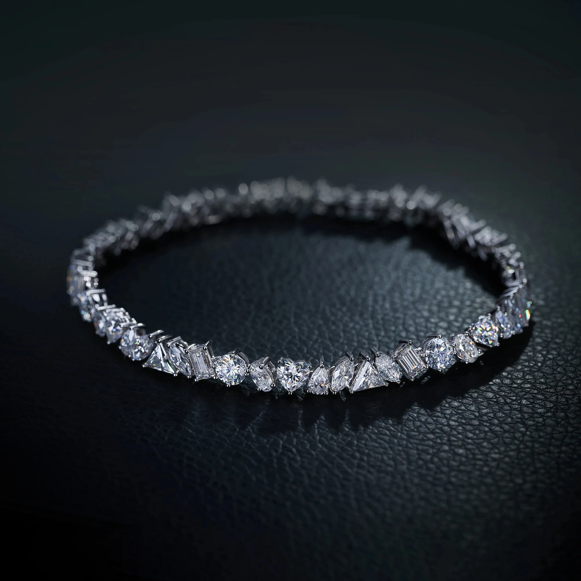 MIXED CUT MOISSANITE TENNIS BRACELET IN SOLID GOLD