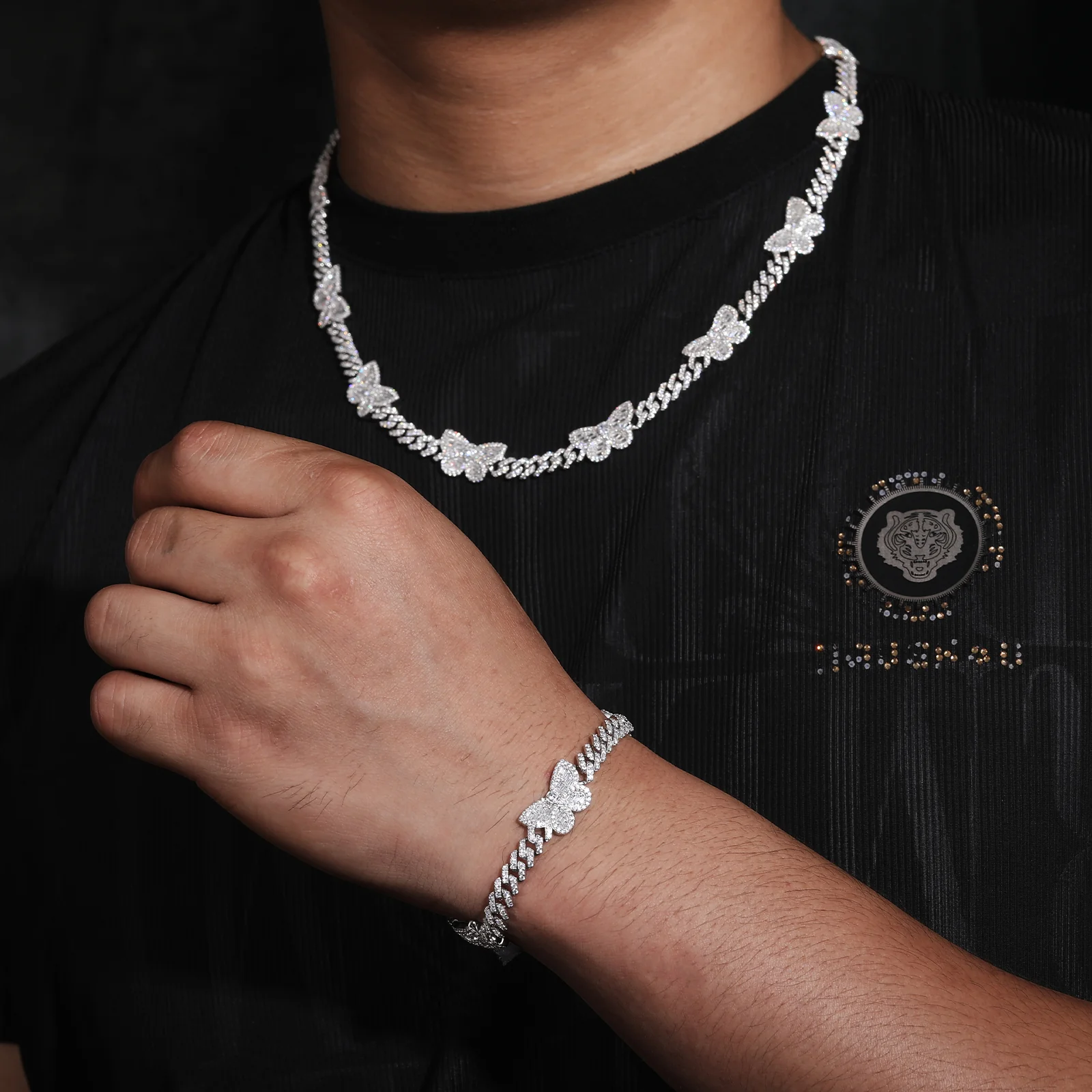 MOISSANITE BAGUETTE BUTTERFLY CHARM CUBAN LINK CHAIN BRACELET IN STERLING SILVER - Image 2