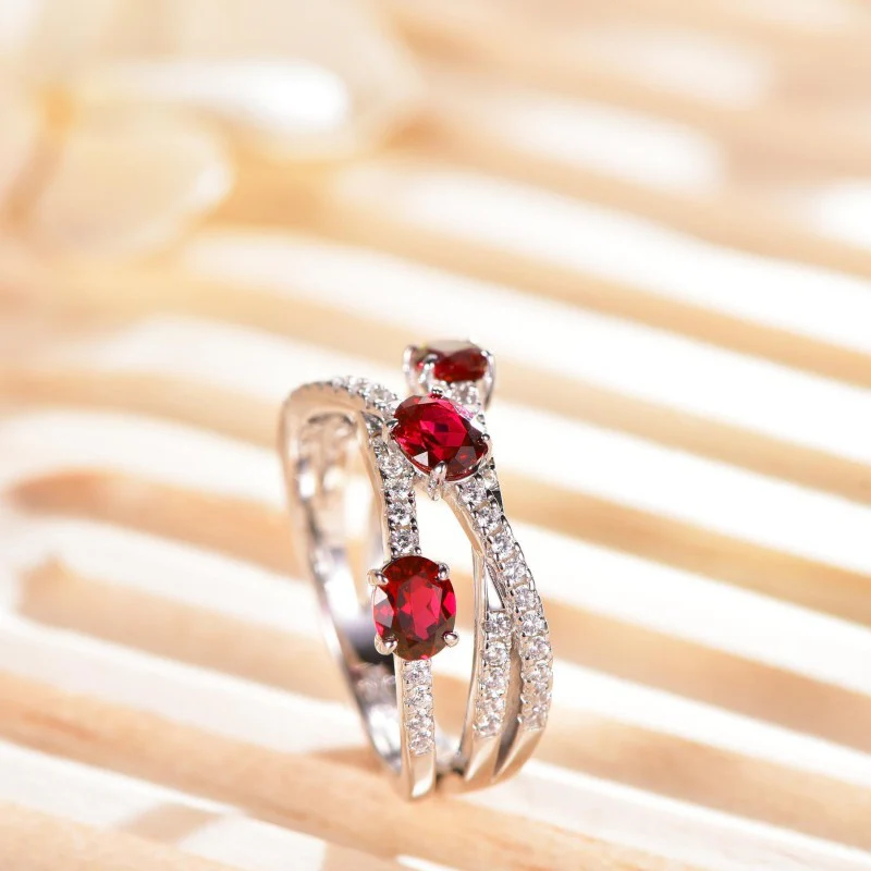 MOISSANITE CROSS GEOMETRIC OVAL CUT RUBY RING IN STERLING SILVER - Image 2