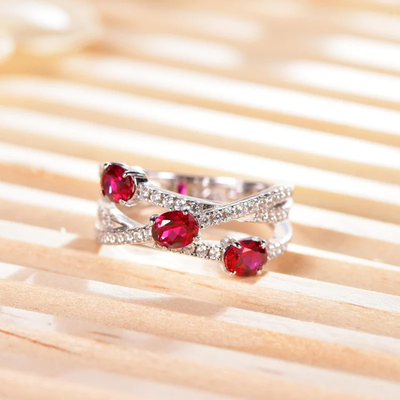 MOISSANITE CROSS GEOMETRIC OVAL CUT RUBY RING IN STERLING SILVER - Image 4