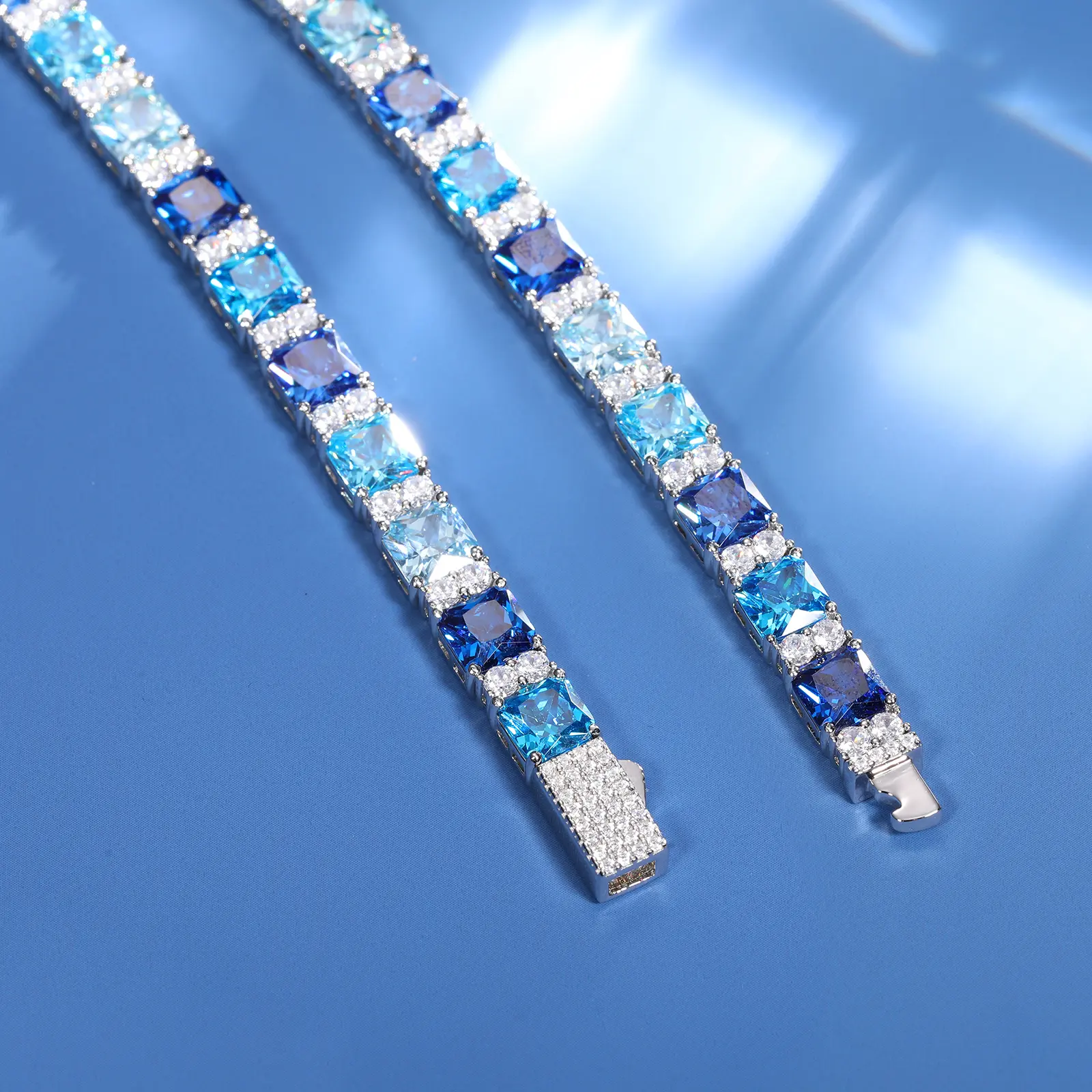 MOISSANITE DIAMOND AND BLUE PRINCESS CUT CZ CLUSTER TENNIS BRACELET IN STERLING SILVER - Image 3