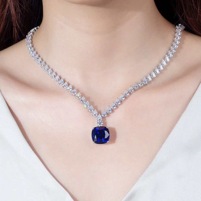 PEAR CUT MOISSANITE AND LAB GROWN SAPPHIRE NECKLACE RING EARRINGS SET IN STERLING SILVER