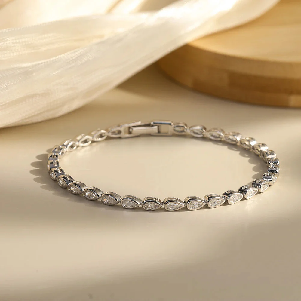 MOISSANITE PEAR CUT BEZEL SETTING TENNIS BRACELET IN STERLING SILVER