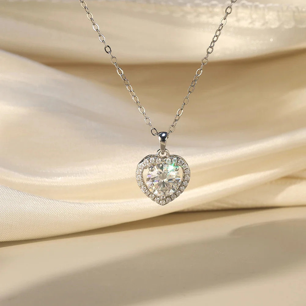 MOISSANITE ROUND BRILLIANT HALO HEART PENDANT IN STERLING SILVER - Image 2