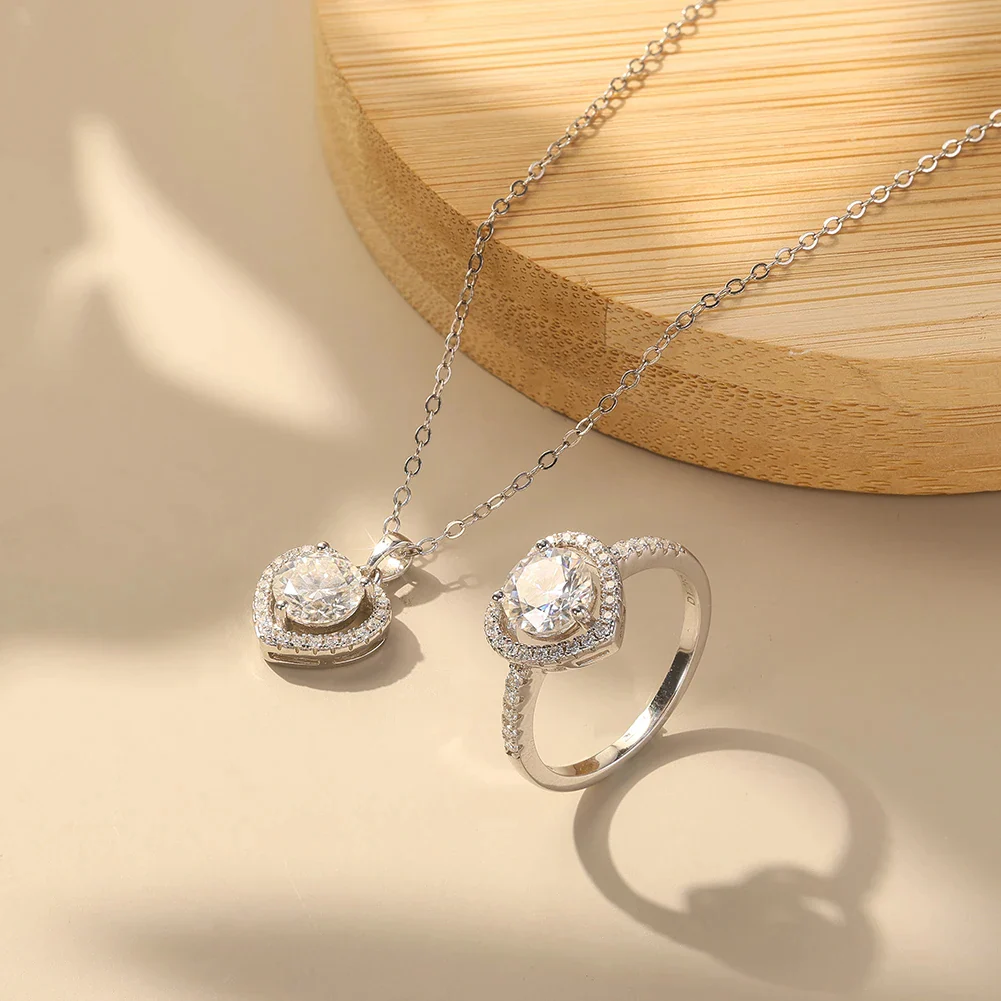 MOISSANITE ROUND BRILLIANT HALO HEART RING IN STERLING SILVER - Image 4