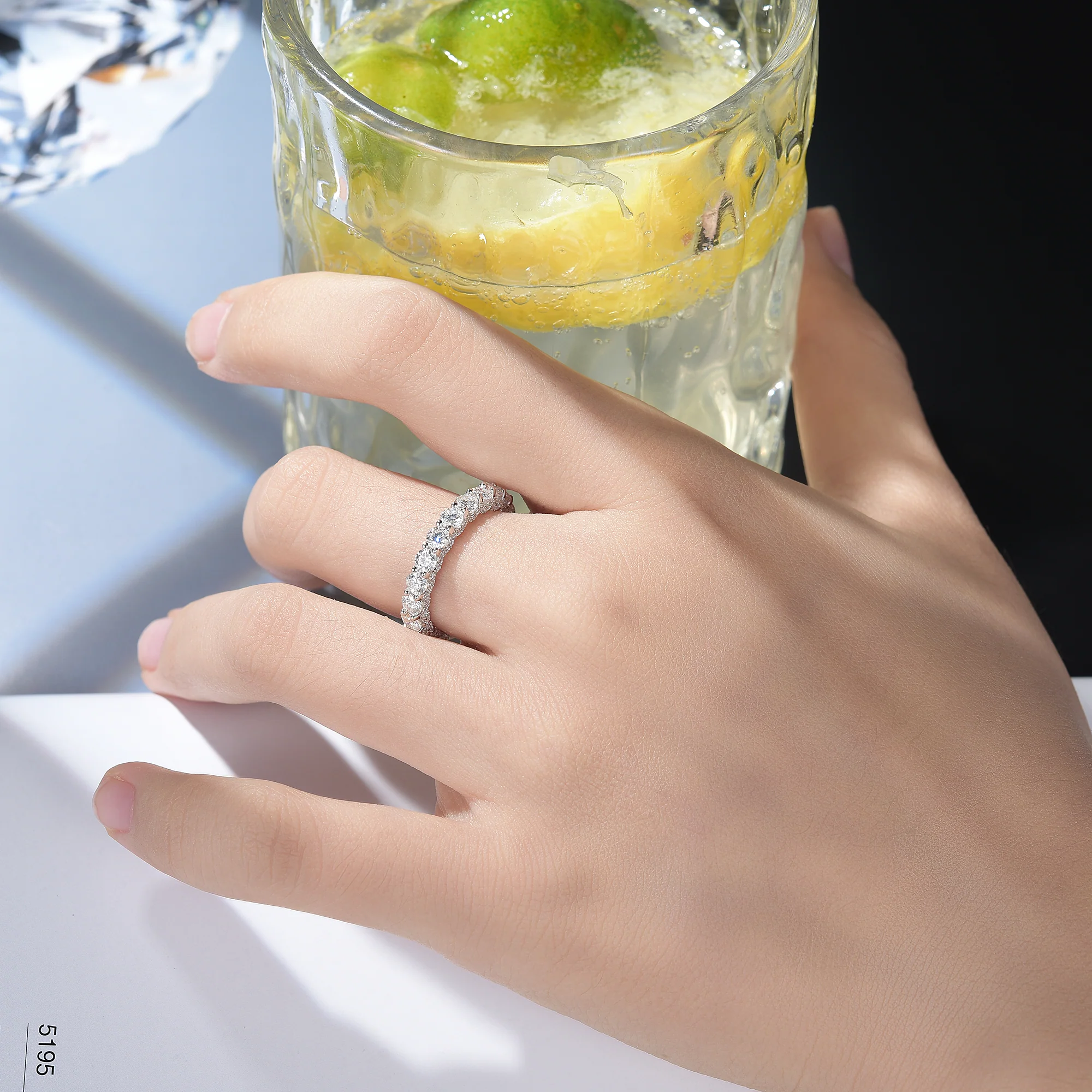 MOISSANITE TENNIS ETERNITY BAND RING WITH SIDE HALO IN STERLING SILVER - Image 2