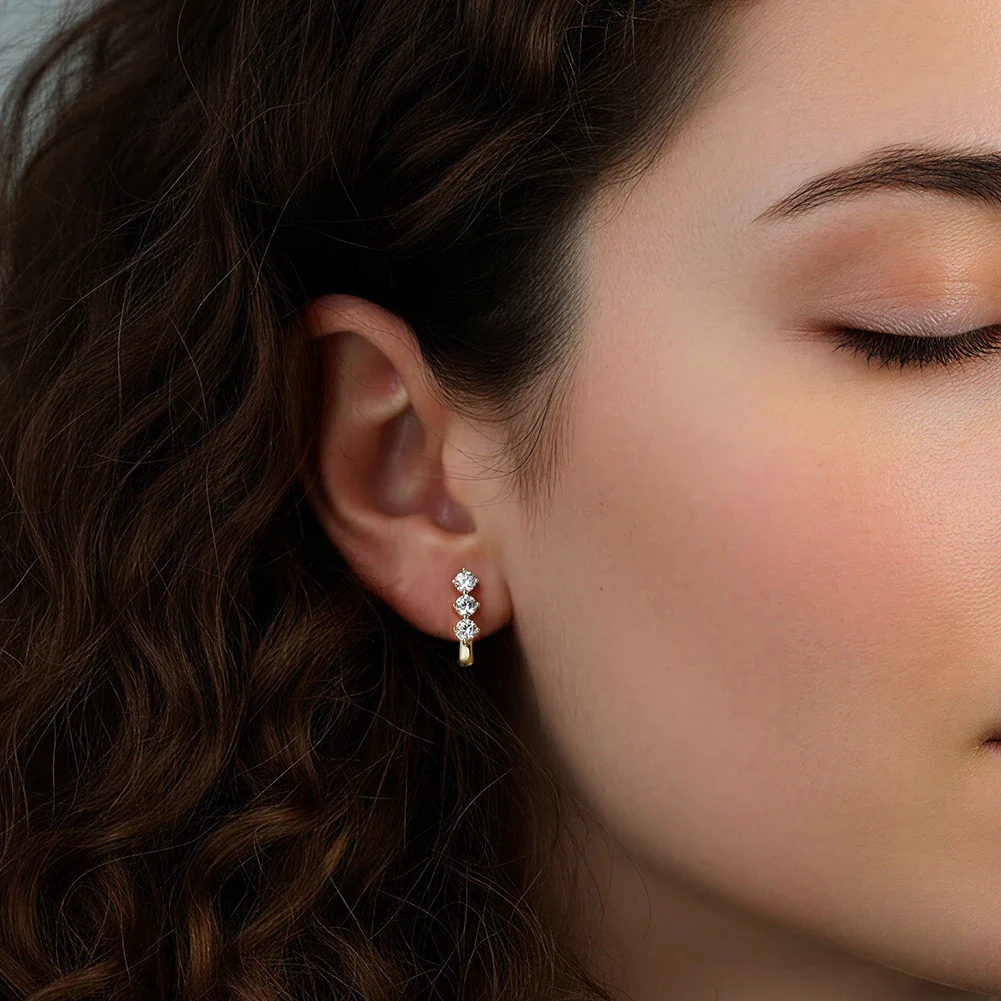 TRIO MOISSANITE HUGGIE HOOPS IN STERLING SILVER - Image 2