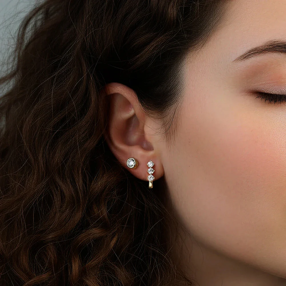 TRIO MOISSANITE HUGGIE HOOPS IN STERLING SILVER - Image 3