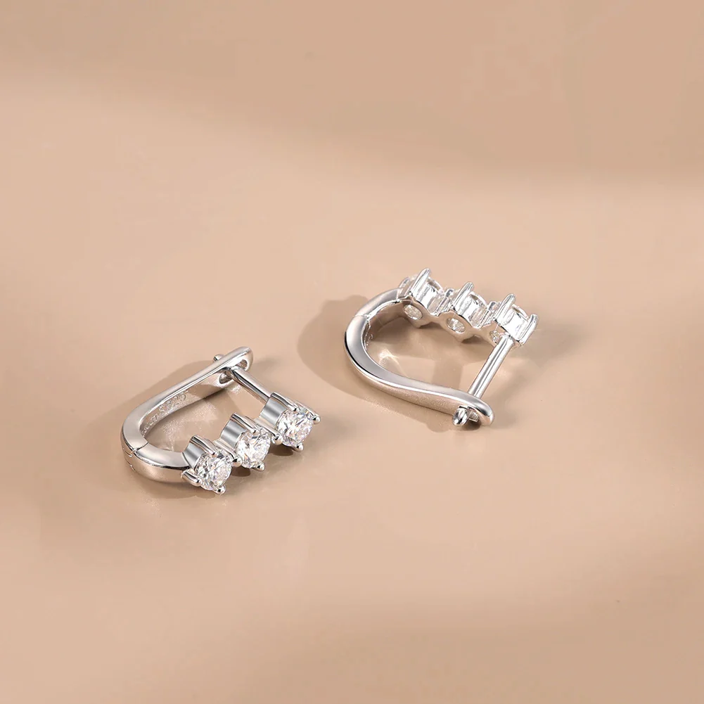 TRIO MOISSANITE HUGGIE HOOPS IN STERLING SILVER - Image 4